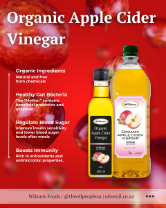 Organic apple cider vinegar with the mother in a glass bottle with apples