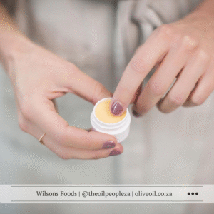 Homemade avocado oil hand balm for dry winter skin in small glass jars